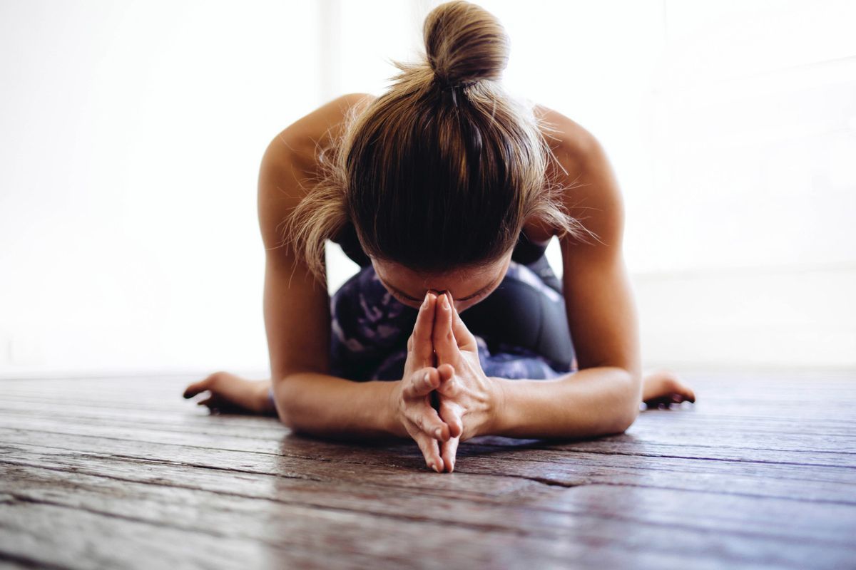 Five Yoga Poses To Do At Your Desk Vogue Australia
